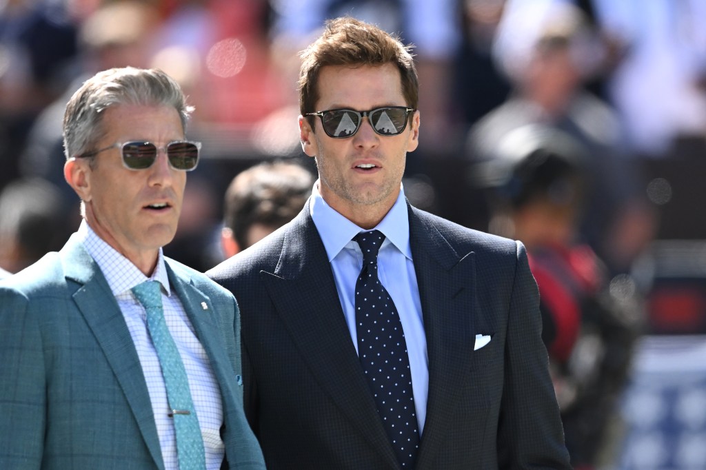 The future Hall of Fame quarterback calls games alongside Kevin Burkhardt (l.).