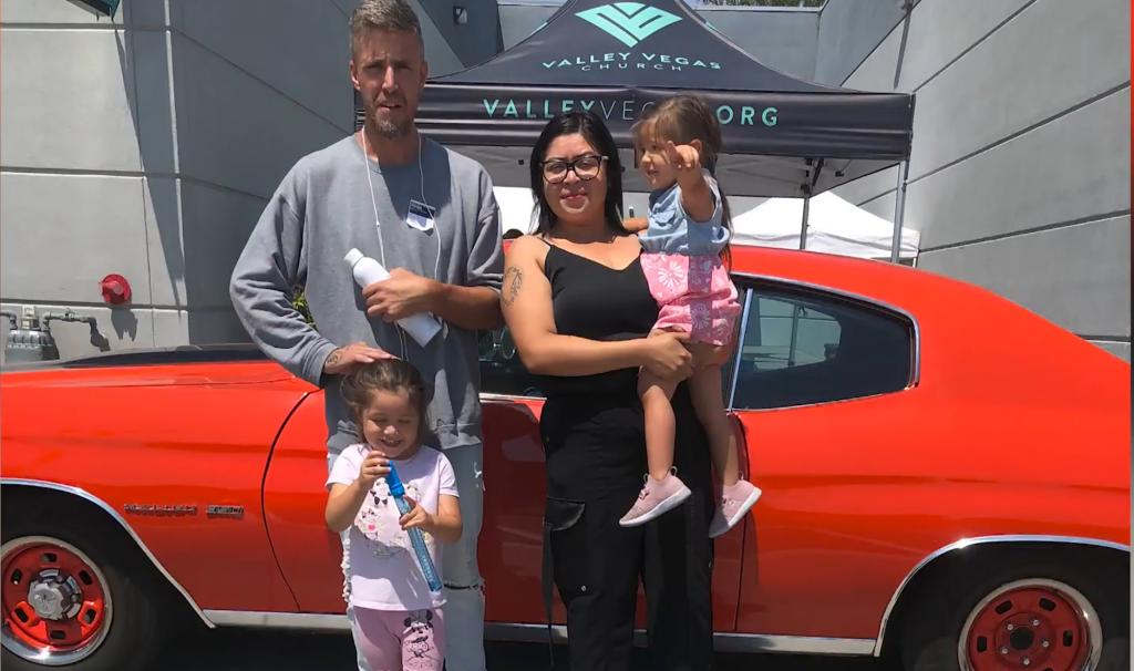 Esther Acosta, Brandon Green and their two daughters.