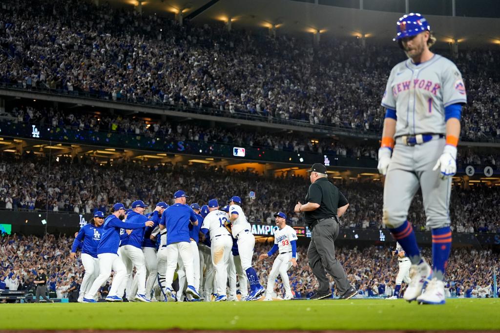 Los Angeles Dodgers team celebrating their win against the New York Mets in Game 6 of the NL Championship Series, in a stadium, on October 20, 2024