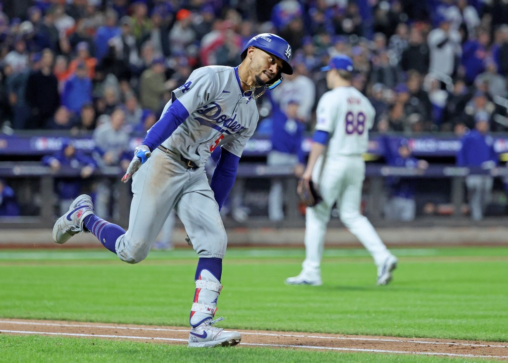 Mookie Betts celebrates during the Dodgers' win over the Mets on Oct. 17, 2024. 