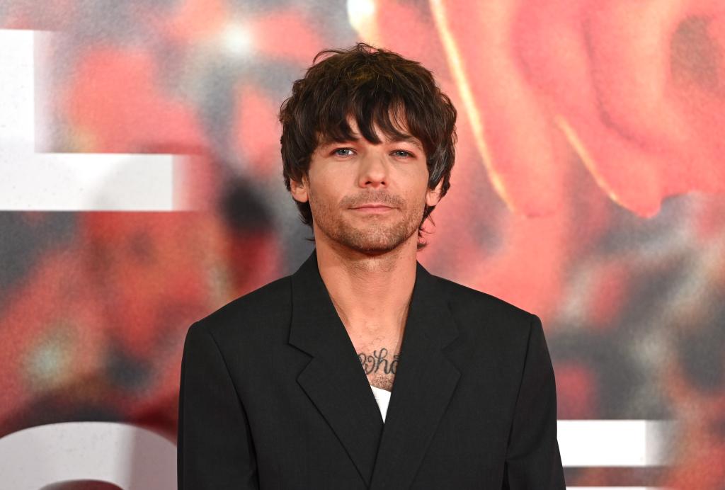 Louis Tomlinson arrives at the "All Of Those Voices."