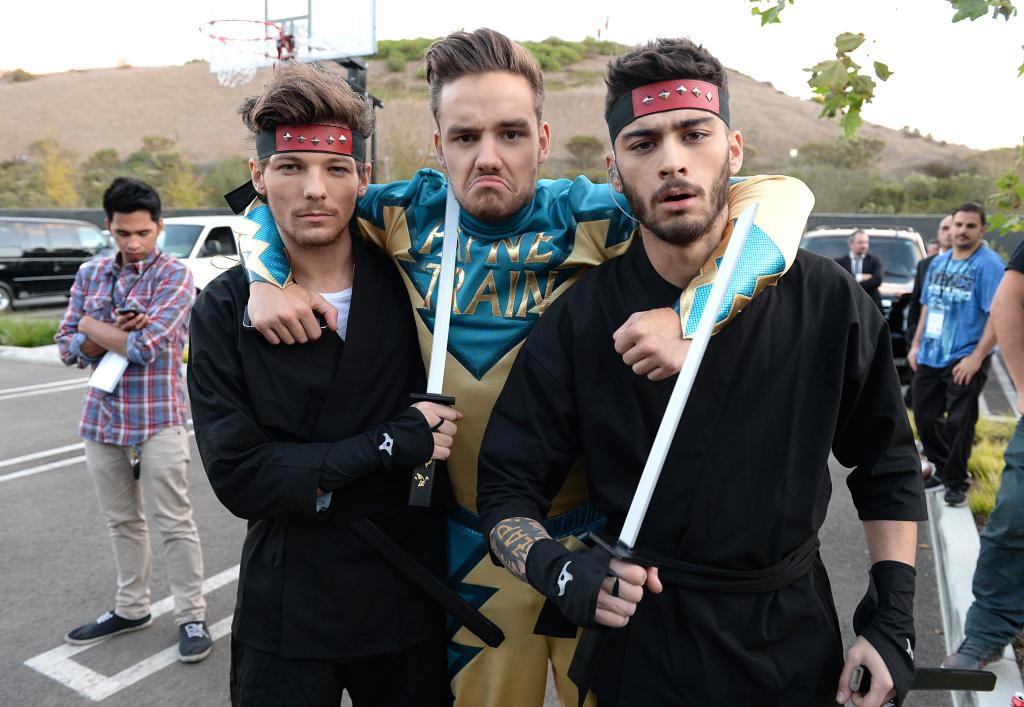 (L-R) Louis Tomlinson, Liam Payne, and Zayn Malik on set during One Direction celebrates 1D Day.