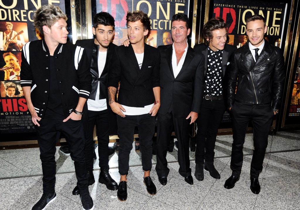 One Direction with Simon Cowell in 2013.