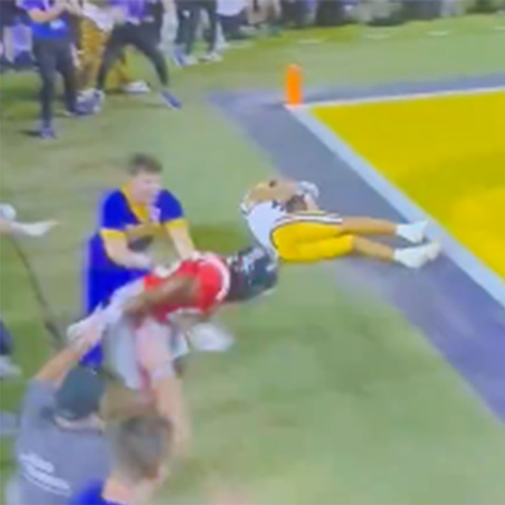 An LSU cheerleader appeared to shove Ole Miss defender Trey Washington with less than two minutes to play in a game against LSU at Tiger Stadium on Oct. 12, 2024.