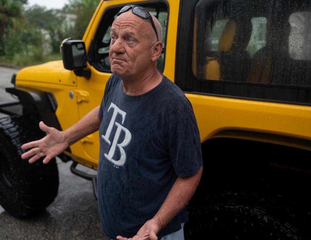 Marc Tucker, 60, has decided to weather the storm at his home in St. Petersburg, where he lives blocks from the water