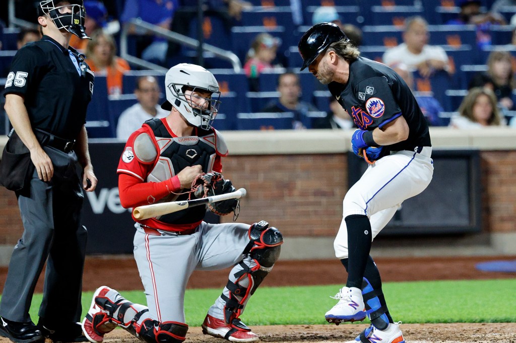 Jeff McNeil gets hit by a pitch during a Sept. 6 game against the Reds.