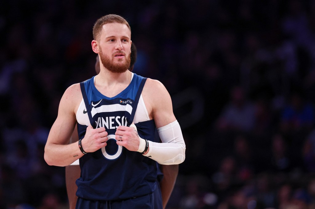 Minnesota Timberwolves guard Donte DiVincenzo (0) looks on during the first half against the New York Knicks at Madison Square Garden on Oct. 13, 2024. 