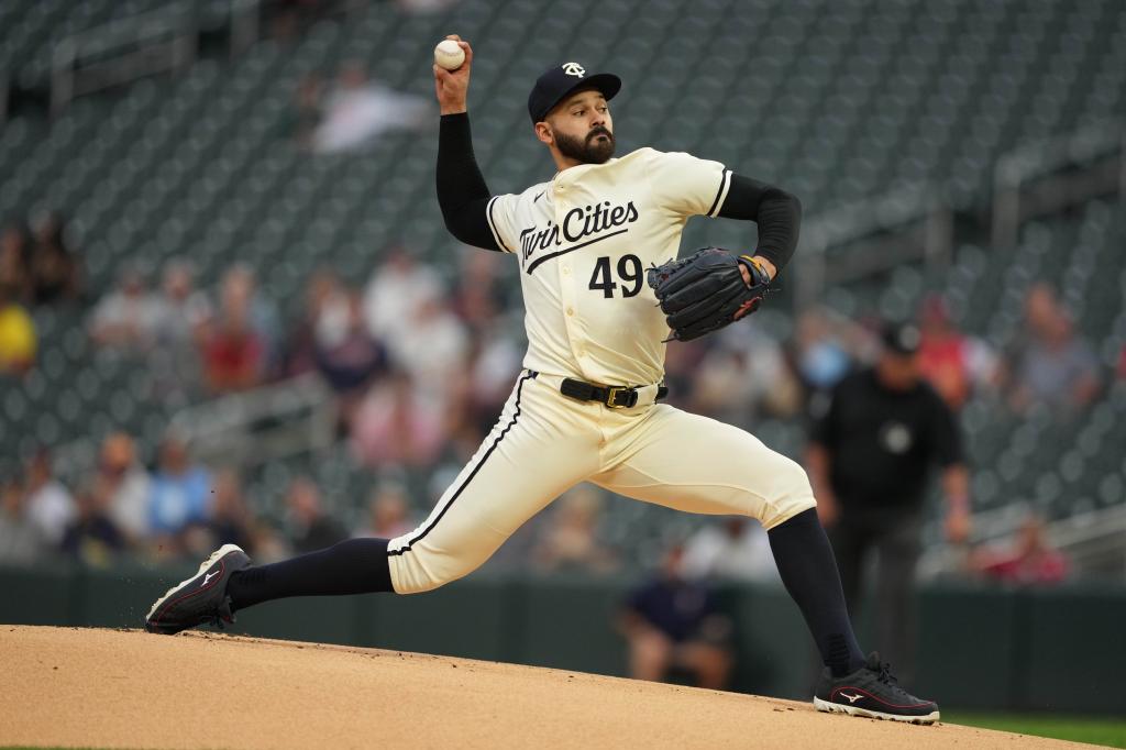 Minnesota Twins starting pitcher Pablo Lopez (49) delivers a pitch during the first inning against the Los Angeles Angels at Target Field. 