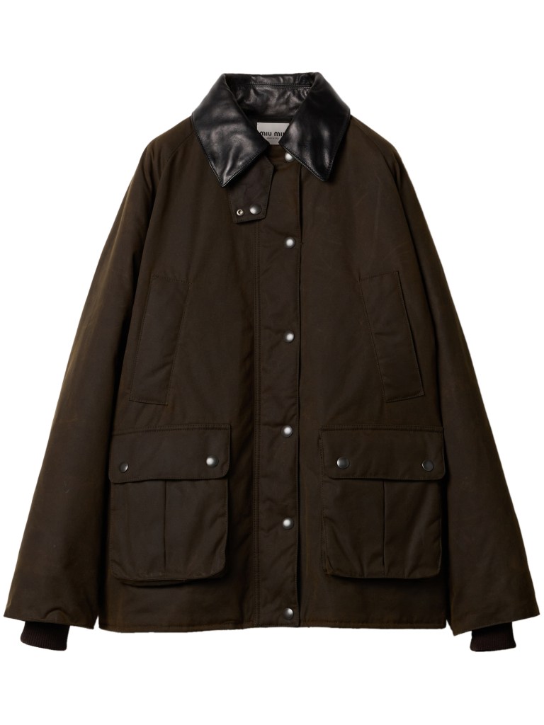 Dark brown Miu Miu waxed canvas blouson jacket hanging on a swinger