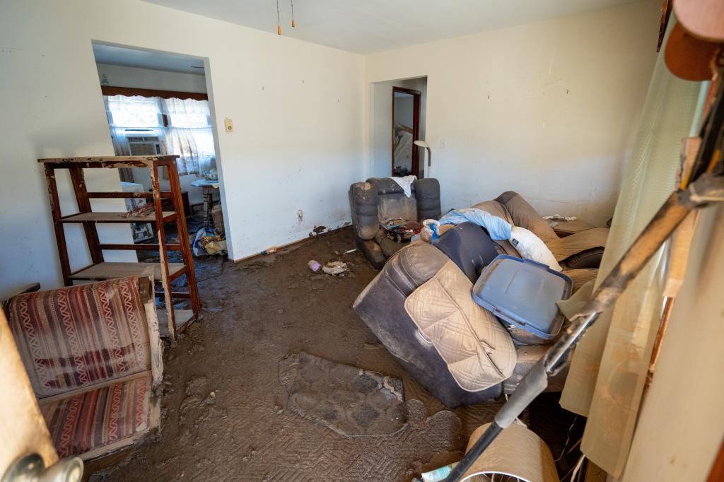 Mud, belongings and furniture remain in the house of a Swannanoa resident 