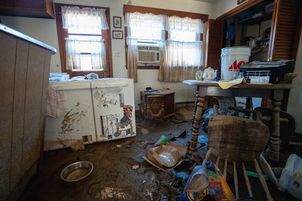 Mud, belongings and furniture remain in the house of a Swannanoa resident 