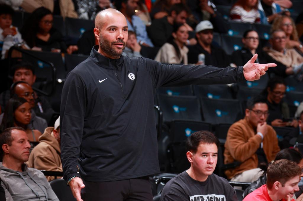 Head Coach Jordi Fernandez of the Brooklyn Nets gesturing during a game against the Toronto Raptors at Barclays Center, Brooklyn, with crowd in the background