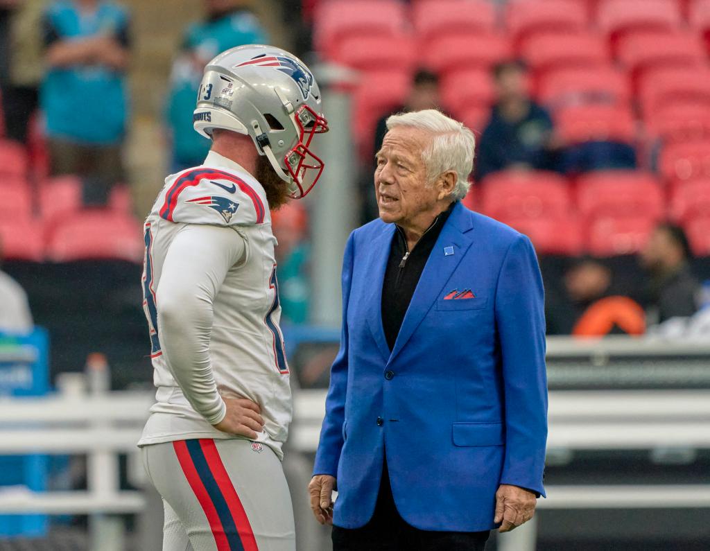 Patriots owner Robert Kraft and Patriots place kicker Joey Slye (13) talk before an NFL International Series game at Wembley Stadium on Oct. 20, 2024. 