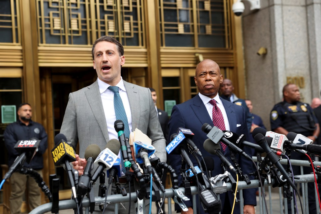 New York City Mayor Eric Adams and lawyer Alex Spiro speak to the media, on the day of Adams arraignment after he was charged with bribery and illegally soliciting a campaign contribution from a foreign national, outside a federal court in New York City, U.S. September 27, 2024.