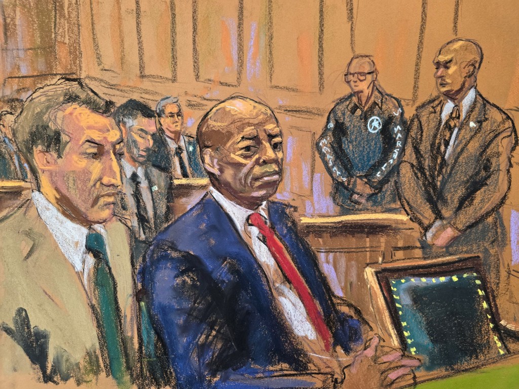 New York City Mayor Eric Adams sits in federal court beside his lawyer Alex Spiro during his arraignment after he was charged with bribery and illegally soliciting a campaign contribution from a foreign national, in New York City, U.S. September 27, 2024 in this courtroom sketch. 