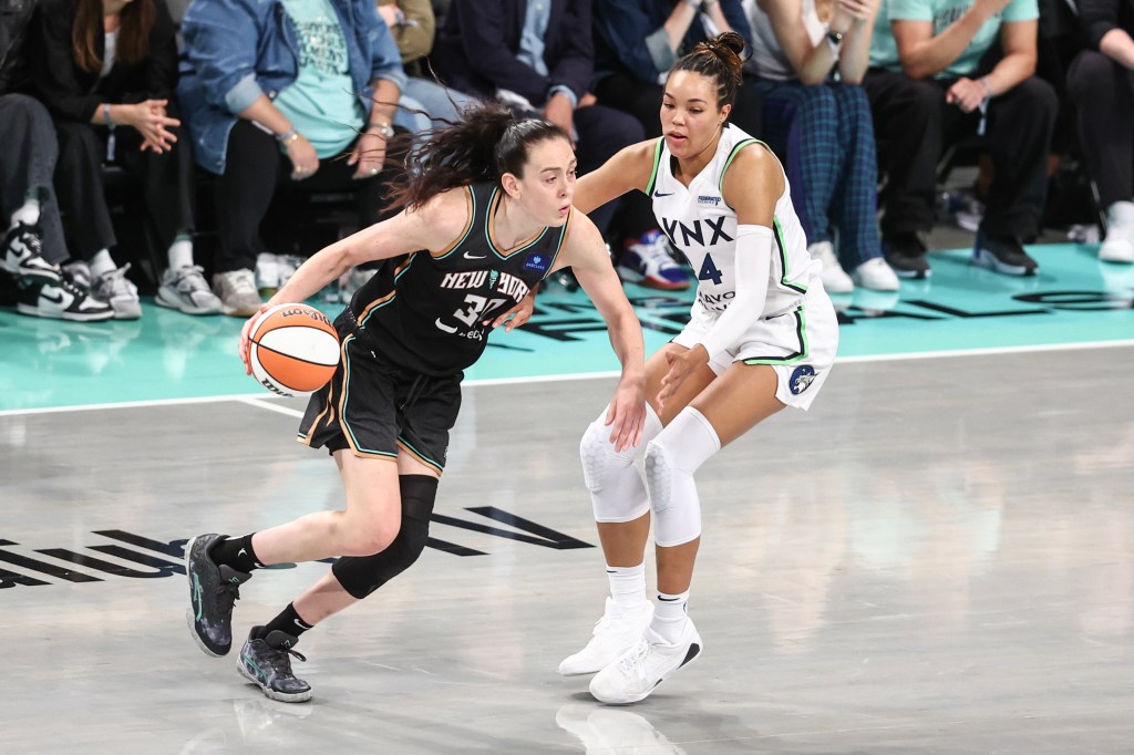 Liberty forward Breanna Stewart (30) looks to drive past Minnesota Lynx forward Napheesa Collier (24) in the fourth quarter during Game 2.