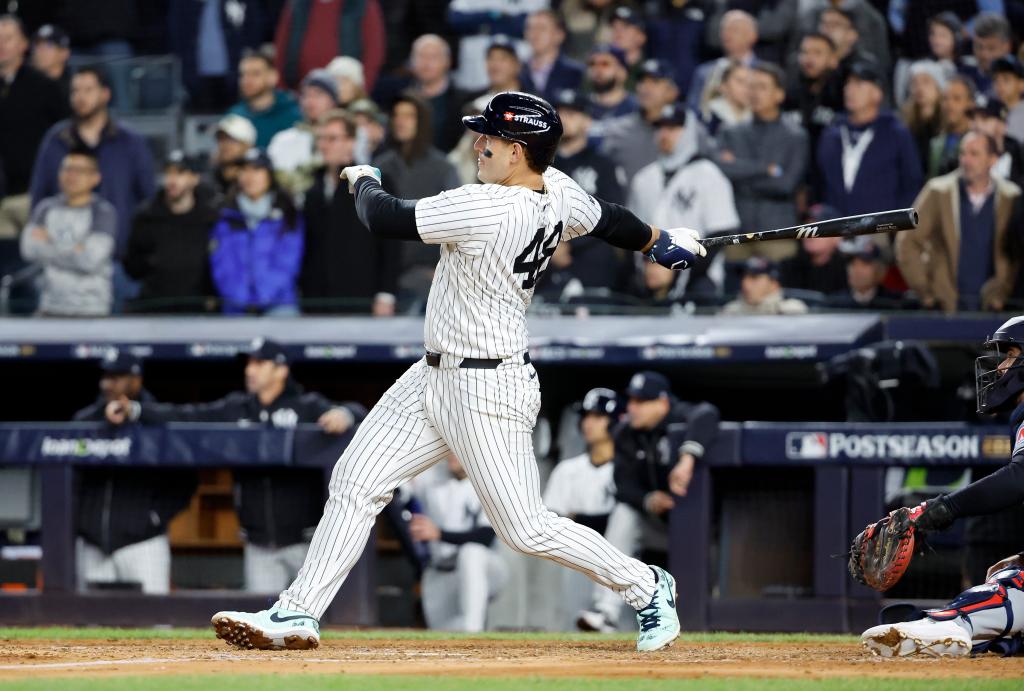 ankees first baseman Anthony Rizzo hits a double allowing New York Yankees shortstop Anthony Volpe to score on an error in the 6th inning