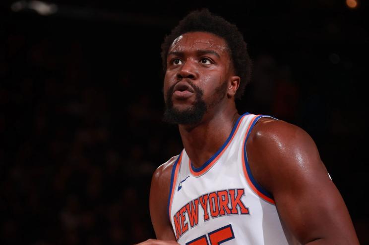 Ariel Hukporti #55 of the New York Knicks shooting a free throw during a game against the Charlotte Hornets at Madison Square Garden in 2024 NBA Preseason