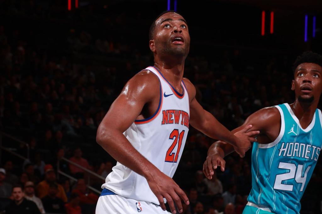 T.J. Warren #21 of the New York Knicks during a game against the Charlotte Hornets at Madison Square Garden in 2024.