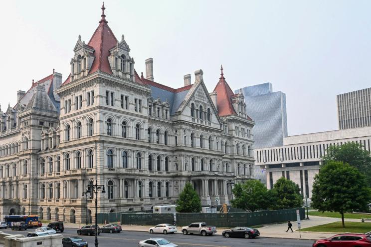 The New York state Capitol is seen from the steps of the State Education Building in Albany, N.Y., June 7, 2023.