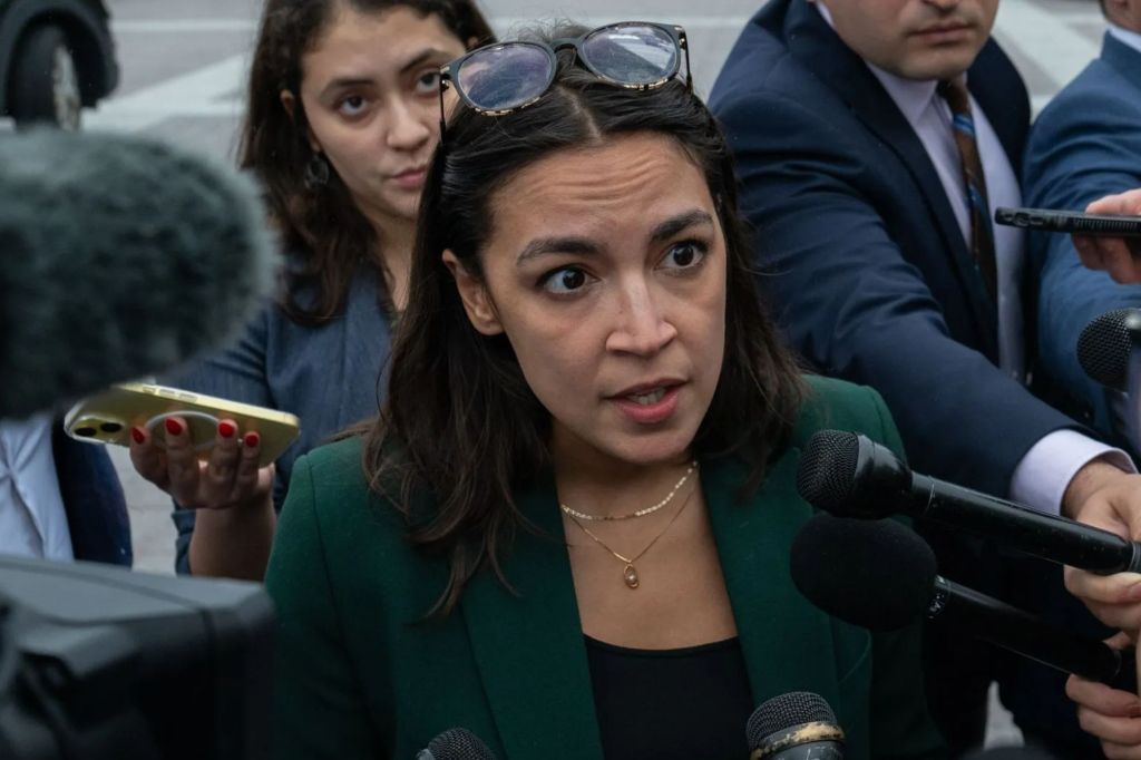 United States Representative Alexandria Ocasio-Cortez (Democrat of New York) talks to press outside the Capitol in Washington, D.C. on Wednesday, September 25, 2024.