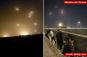 Dozens of Iranian ballistic missile impacts reported across Israel after nearly 200 deadly explosives launched at Jewish state