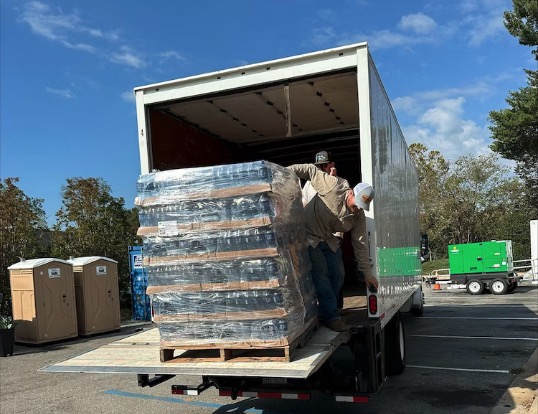 A truck of bottled water arriving at an Ascent Healthcare Management nursing home.