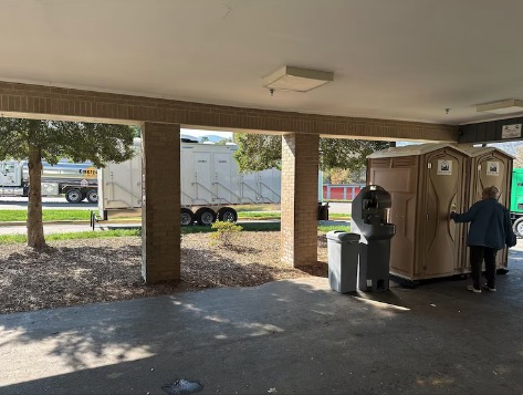 Shower trailers and portable toilets being brought to a Ascent nursing home.