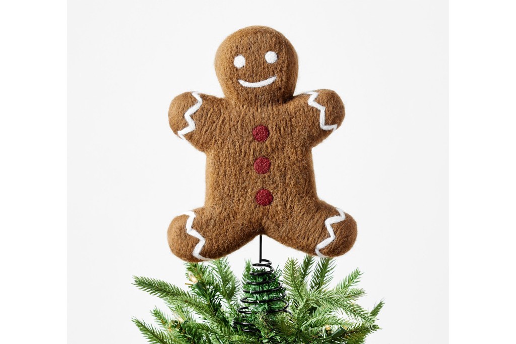 Gingerbread man hanging on a tree