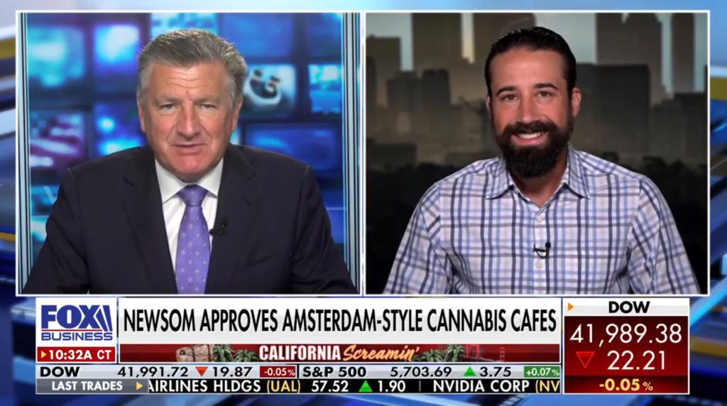 Two men discussing on a news show, one being a celebrity chef expressing his concerns about introducing Amsterdam-style cannabis cafes in California