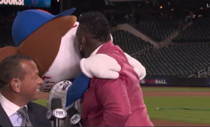 David Ortiz plans a kiss on Mrs. Met.