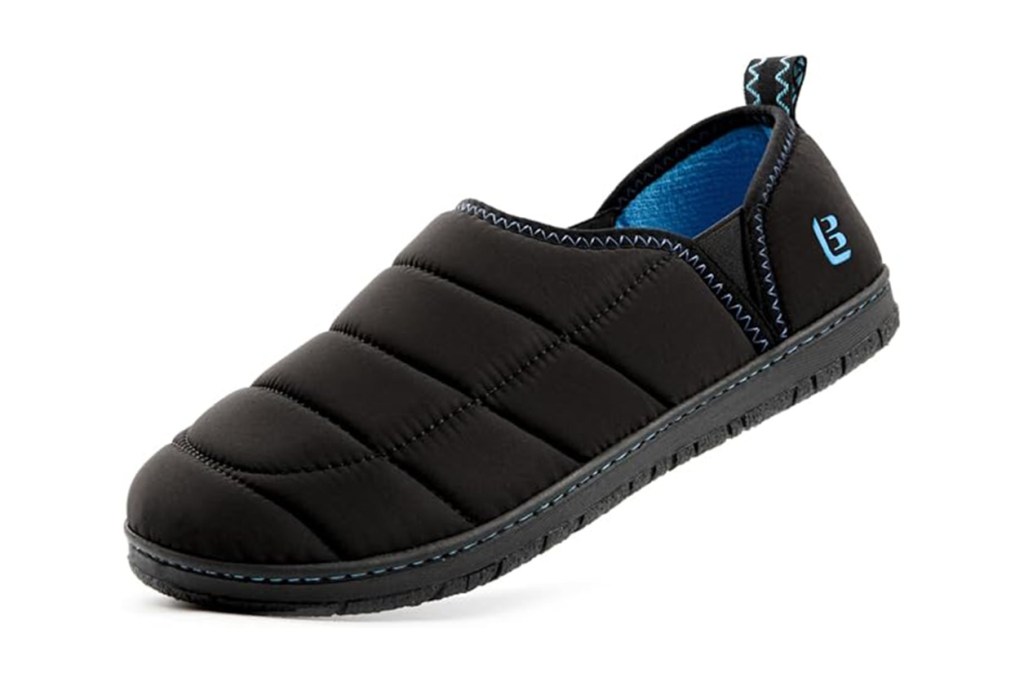 Black slipper with blue trim outdoors