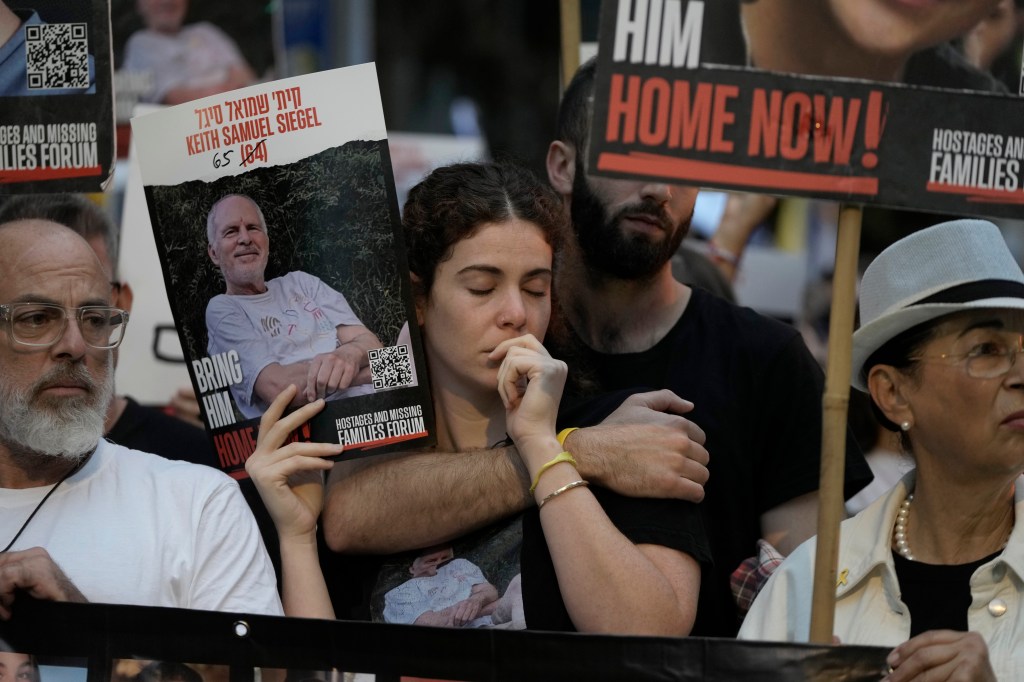 People protest on the one-year anniversary of the Hamas attack on Israel and call for the release of hostages held by Hamas in the Gaza Strip, outside Prime Minister Benjamin Netanyahu's house