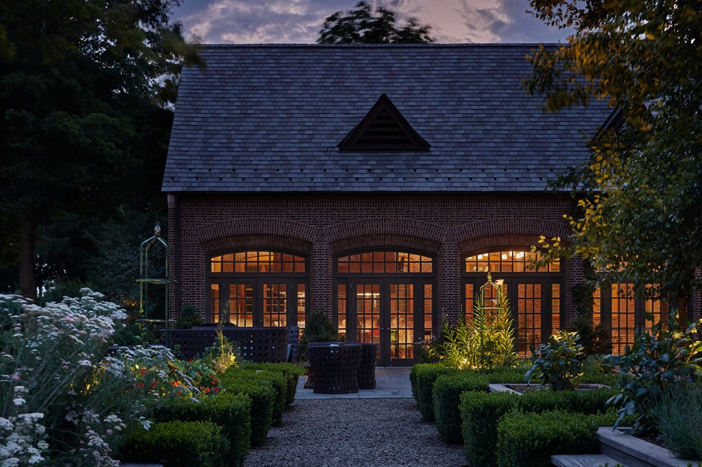 A brick building featuring a spa and billiards room at Pendry Natirar