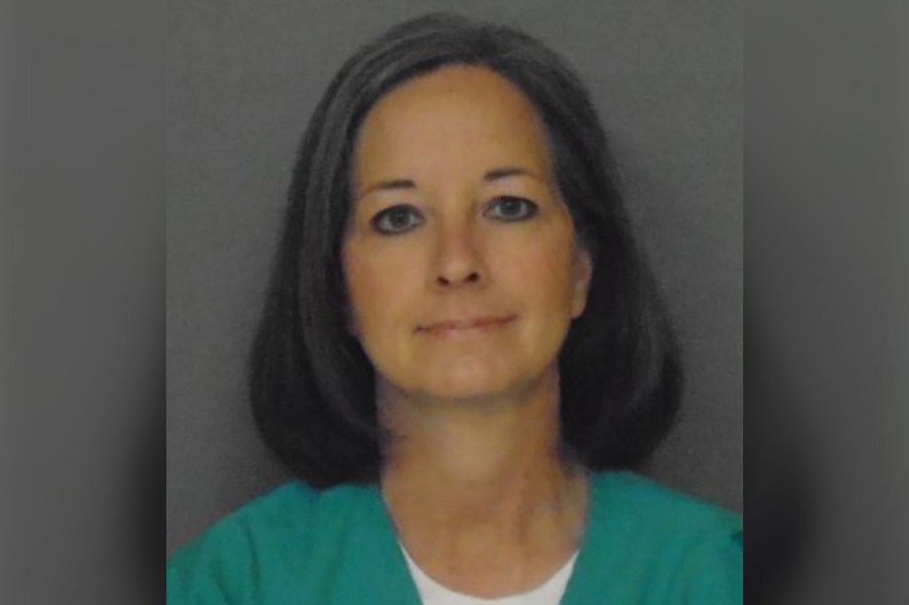 A woman named Susan Smith, wearing a green shirt, in a South Carolina Corrections photo