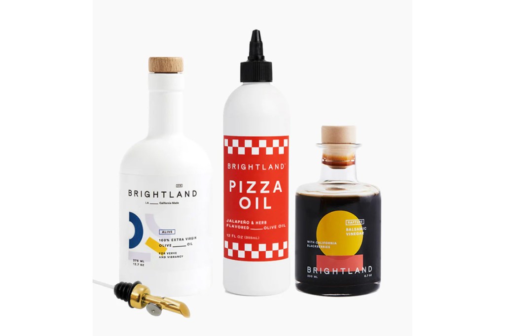 A group of bottles of oil and a bottle of liquid