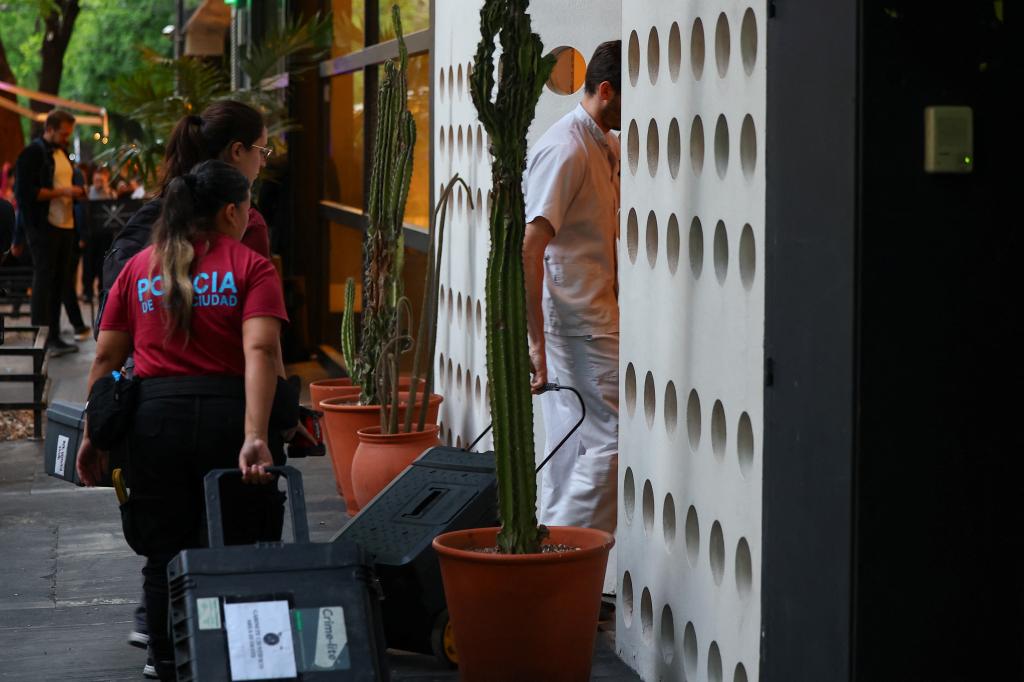 Emergency services arrive at the Buenos Aires hotel on Oct. 16.