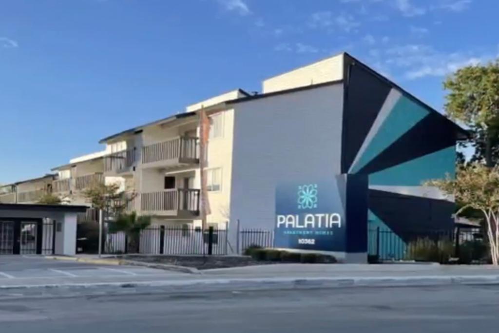 Law enforcement agencies raided the Palatia apartment complex before dawn.