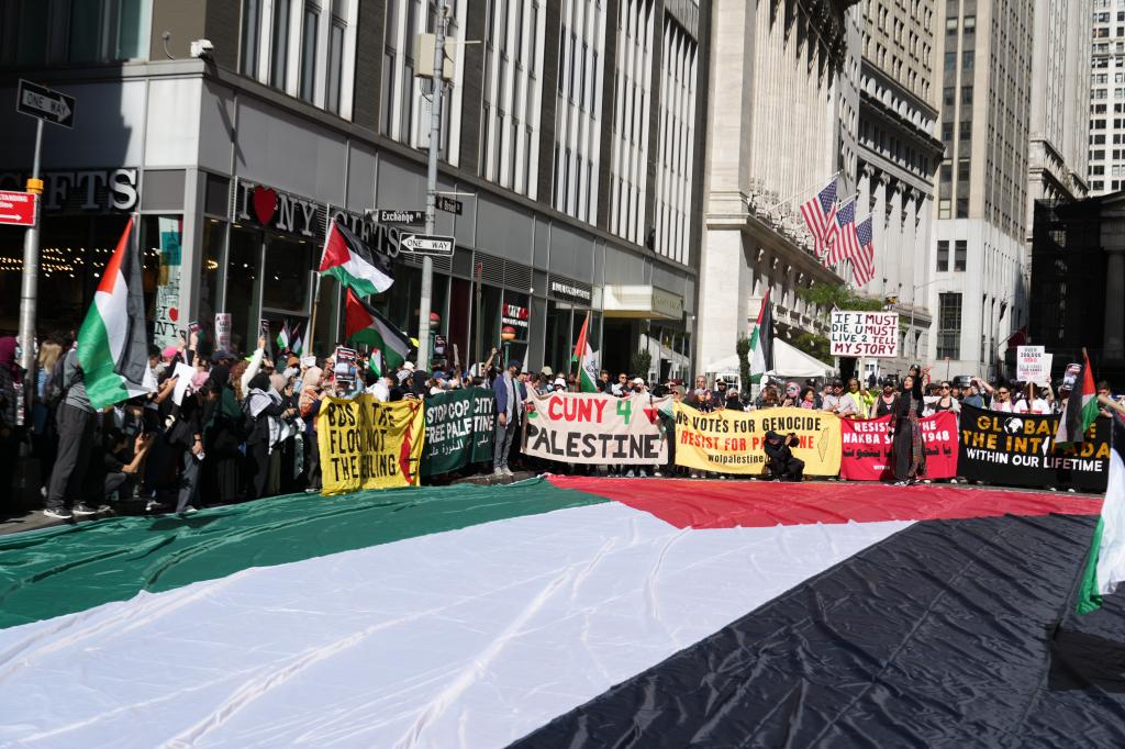 Pro-Palestinian protesters praying. 