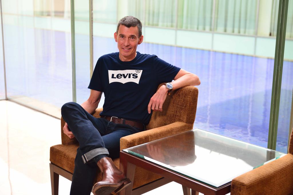 Profile photo of Charles V Bergh, President & CEO of Levi Strauss & Co, sitting in a chair, taken in Gurgaon, India, on June 1, 2017