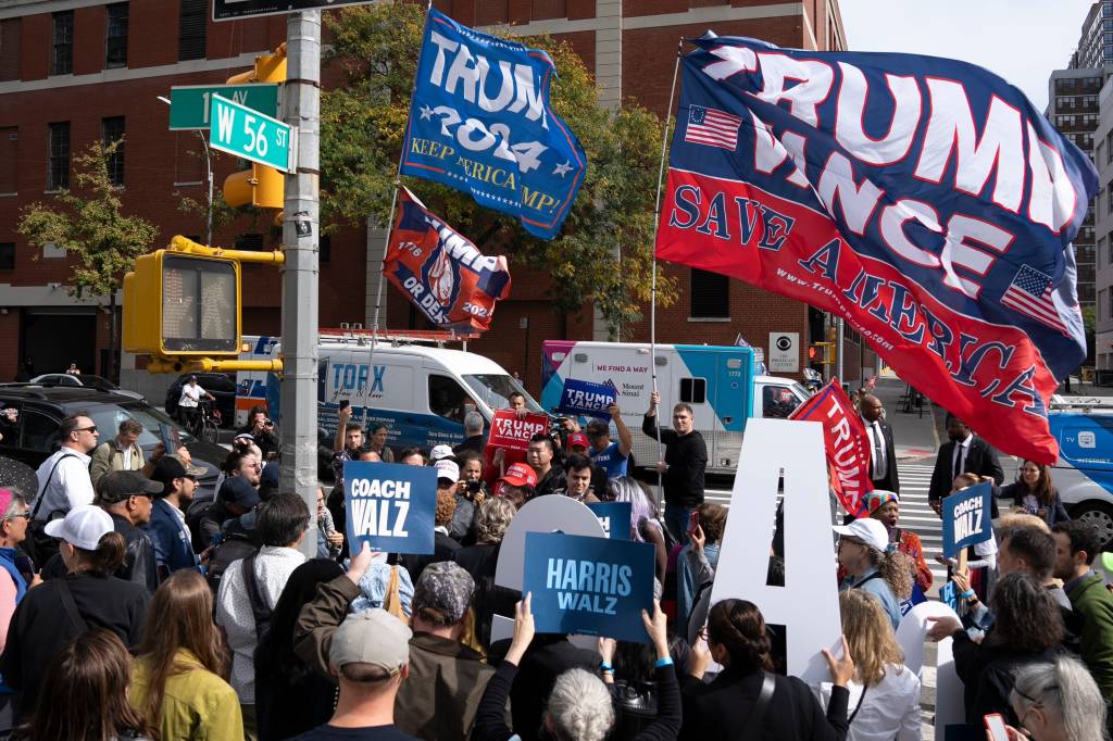 Trump and Harris supporters facing off before the debate in Manhattan.