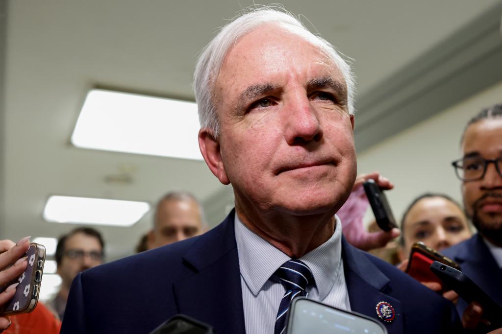 Rep. Carlos Gimenez (R-FL) speaks to reporters as he leaves a meeting with House leadership at the Rayburn House Office Building on October 19, 2023 in Washington, DC. 