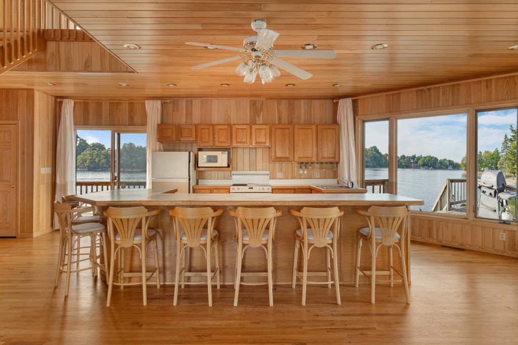 The kitchen even comes replete with cedar design details.