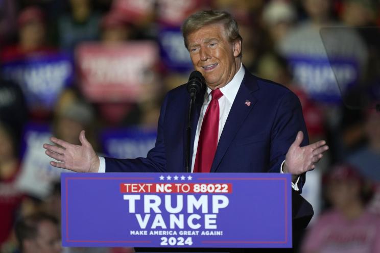 Former President Donald Trump speaking at a campaign rally in Greenville, NC, in 2024