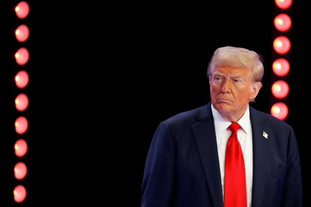 Republican presidential nominee and former U.S. President Donald Trump looks on as he participates in a town hall presented by Spanish-language network Univision, in Doral, Florida, U.S., October 16, 2024.