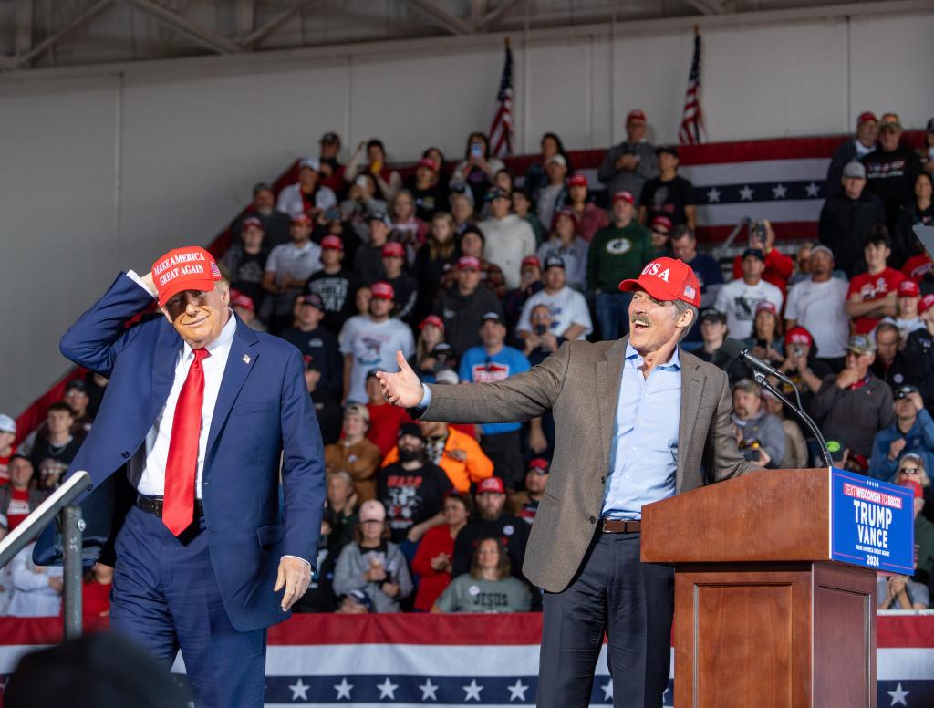 Republican U.S Senate candidate Eric Hovde and former President Donald J. Trump on stage at a rally at the Dodge County Airport, Juneau, Wis., on October 6, 2024