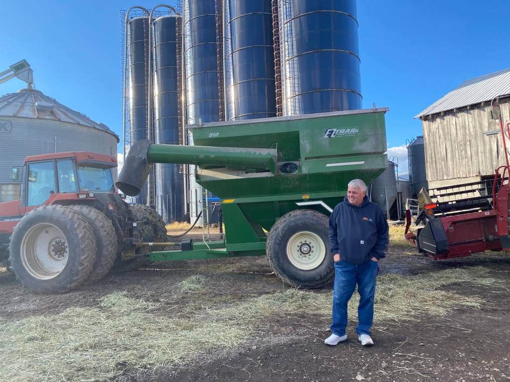 Rick Telesz with his tractor on his farm.