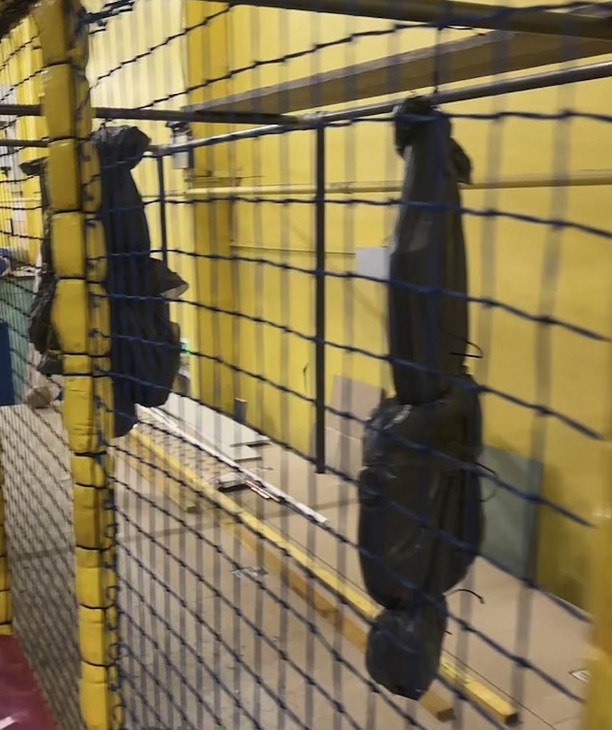 Macabre body bags are seen displayed at the children's activity center.