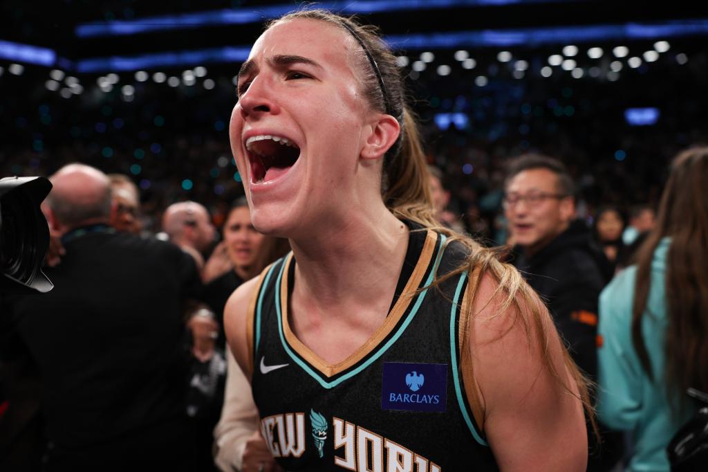 Sabrina Ionescu celebrates after the Liberty won the WNBA championship on Oct. 20, 2024. 