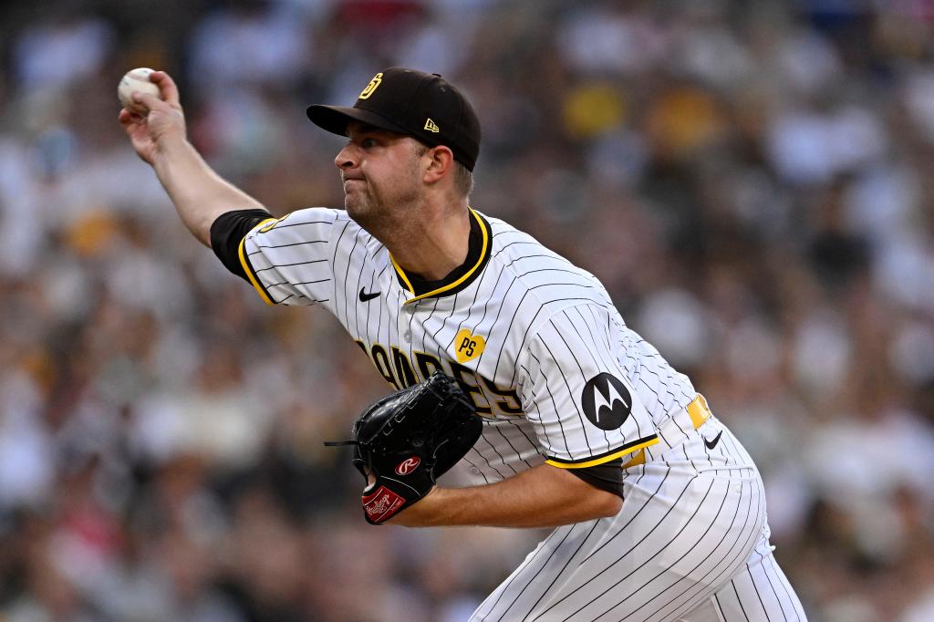 San Diego Padres pitcher Michael King (34) throws a pitch against the Atlanta Braves during the first inning in game one of the Wildcard round for the 2024 MLB Playoffs at Petco Park. 